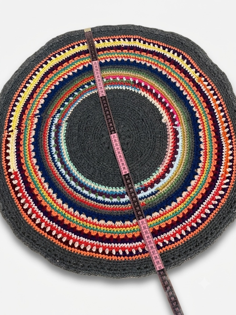 Handmade Round Crochet Rug in Charcoal with Rainbow Stripes